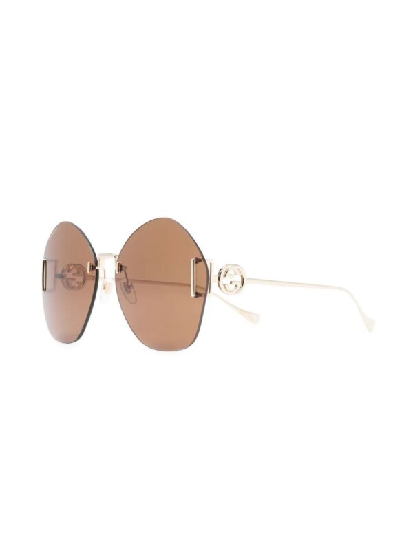 Gucci Eyewear Zonnebril met gegraveerd logo - Goud
