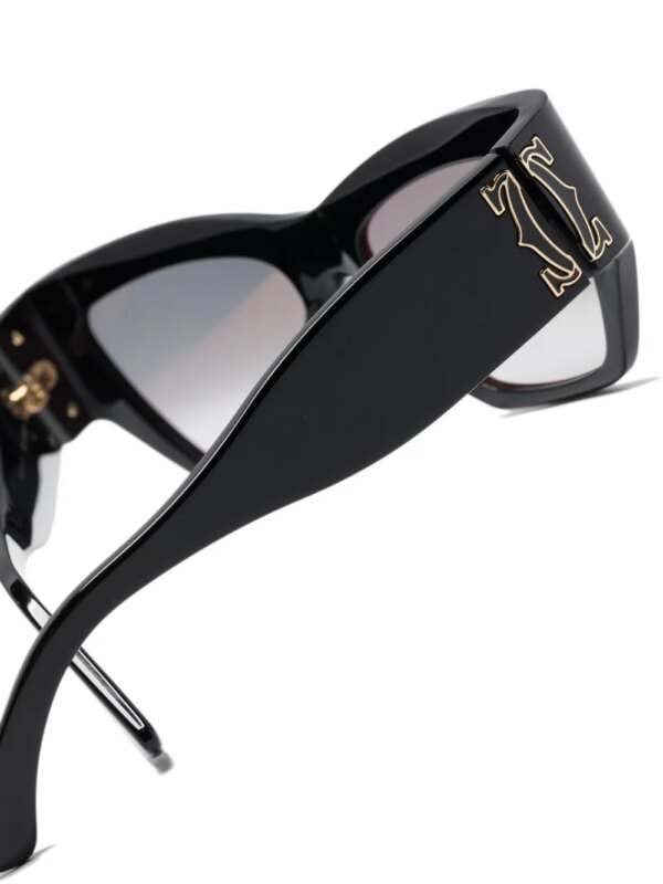 Cartier Eyewear Zonnebril met cat-eye montuur en logo-reliëf - Zwart