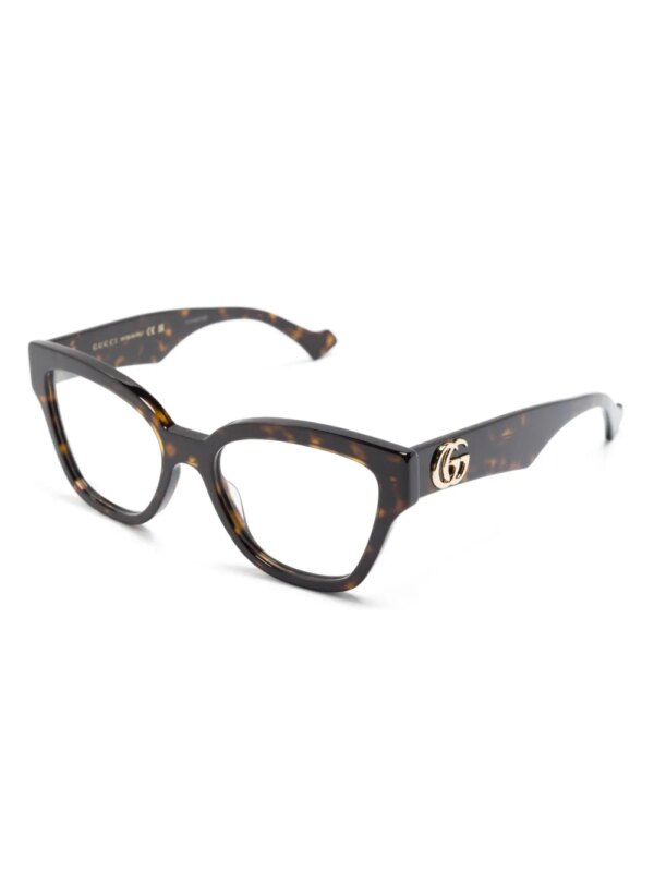 Gucci Eyewear Zonnebril met vlinder montuur - Bruin