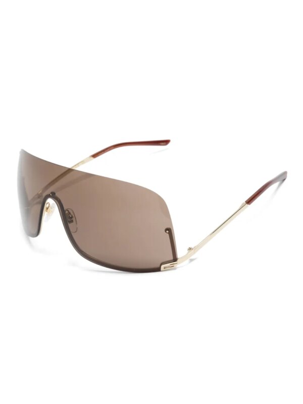 Gucci Eyewear Zonnebril met schild montuur en vierkant G patroon - Goud