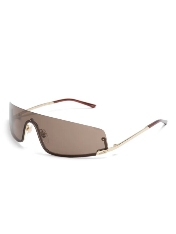 Gucci Eyewear Zonnebril met schild montuur en vierkant G patroon - Goud