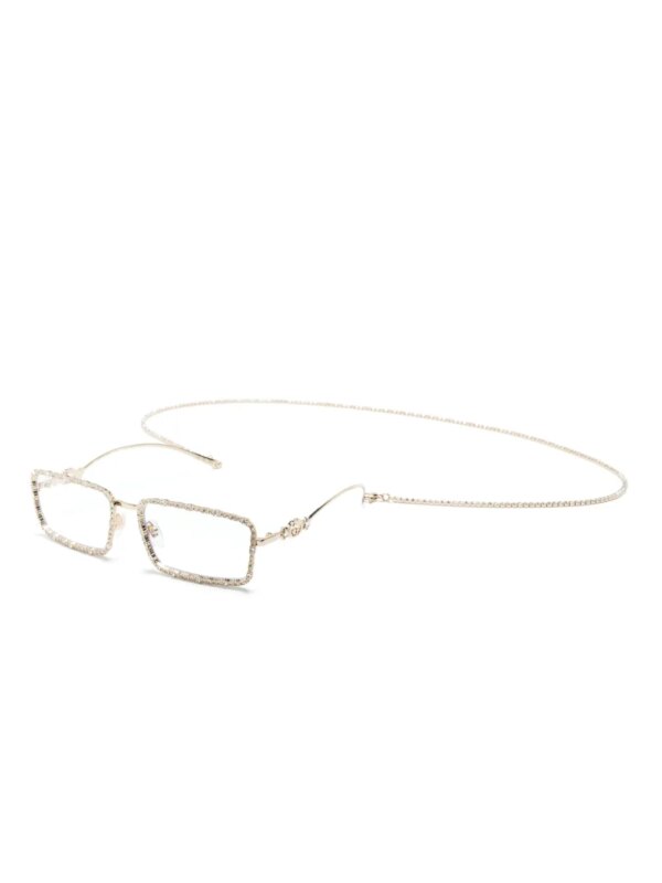 Gucci Eyewear Zonnebril verfraaid met kristallen - Goud