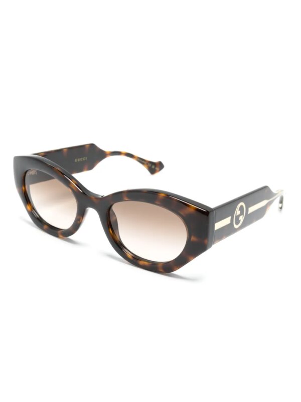 Gucci Eyewear Zonnebril met ovalen montuur - Bruin