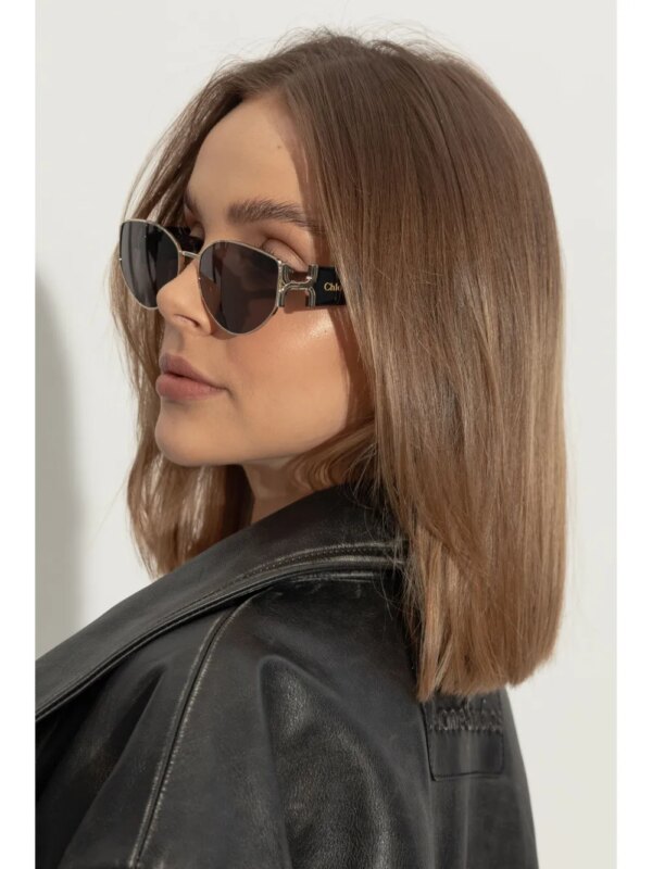 Chloé Eyewear Zonnebril met ovalen glazen en gegraveerd logo - Zwart