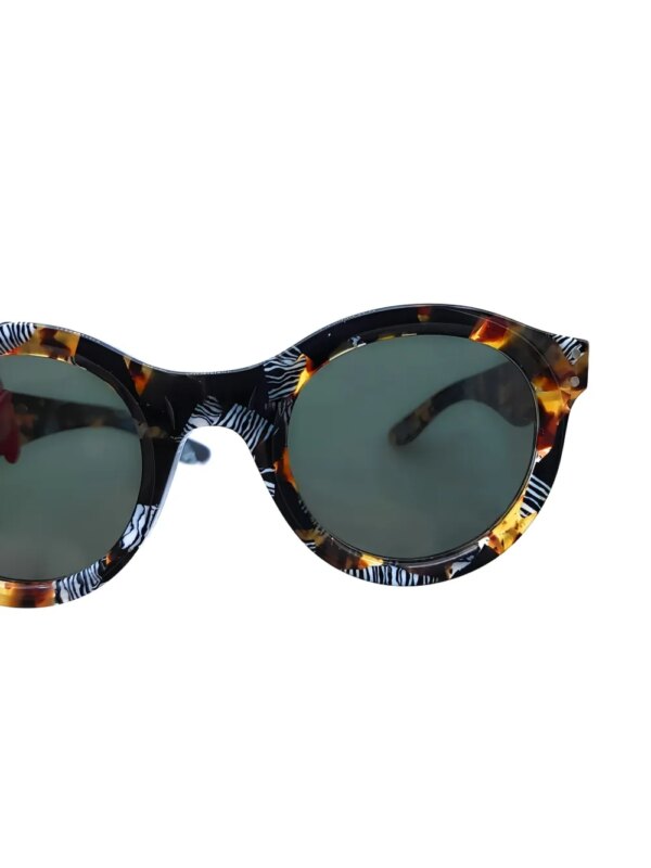 Kador Zonnebril met zebraprint en rond muntuur - Zwart