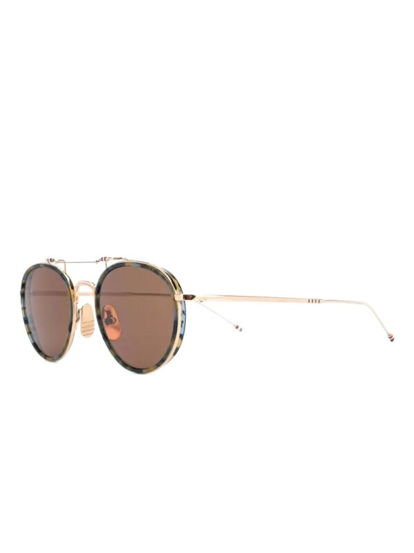 Thom Browne Eyewear Zonnebril met rond montuur en schildpadschild design - Blauw