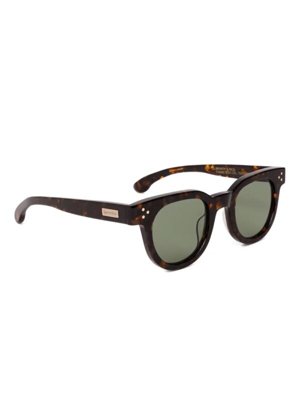 Sporty & Rich Zonnebril met rond montuur en schildpadschild design - Bruin