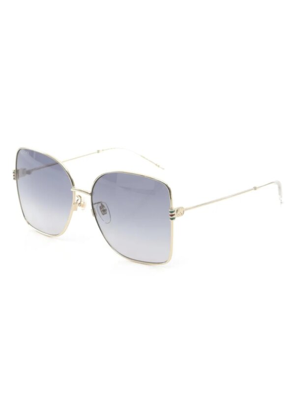 Gucci Pre-Owned 20s GP zonnebril met vlinder montuur - Goud
