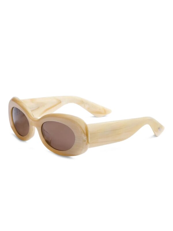 KHAITE Zonnebril met ovalen montuur - Beige